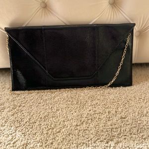 Halogen envelope purse with shoulder strap